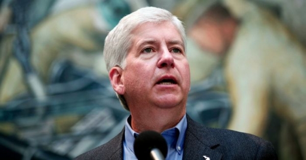 Michigan Governor Rick Snyder speaks at a press conference at the Detroit Institute of Arts June 9, 2014 in Detroit, Michigan. 