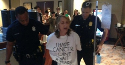 Protesting Big Pharma 'Death Sentence,' Cancer Patient Arrested Outside TPP Talks