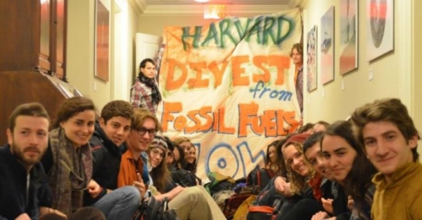 Over 30 students launched a sit-in protest at Harvard demanding divestment from the fossil fuel industry, Thursday, February 12. 