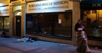 Homeless woman charged with 'theft of services' for charging cell phone outside